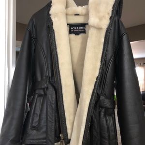Genuine Wilson leather jacket. Fully lined w/ fur